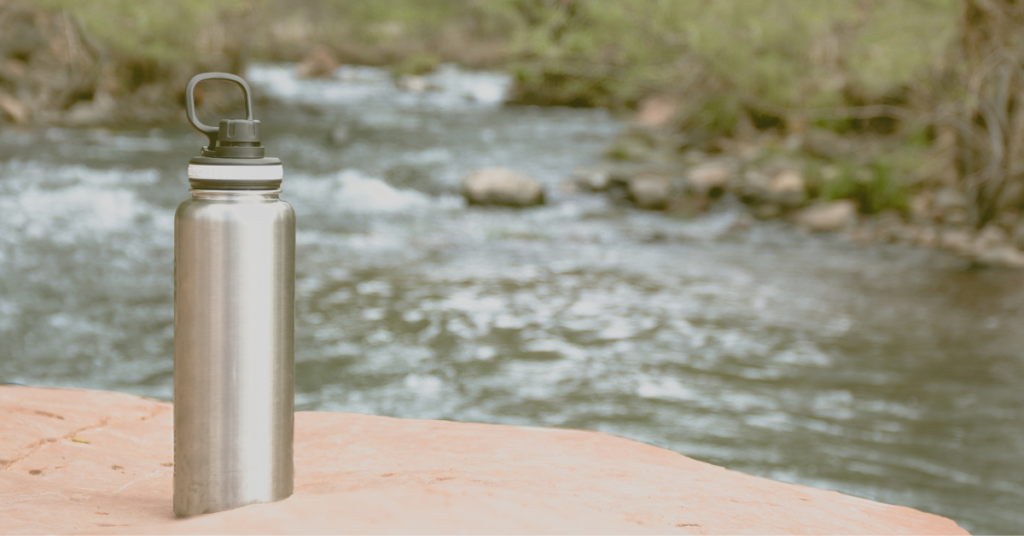 Water Bottle At A Stream