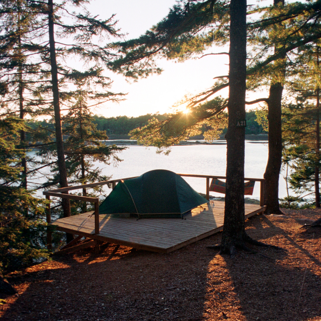 Photo of a tent set up on a camping platform on the ocean in Acadia National Park